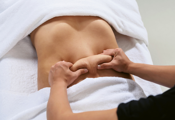 Abdominal massage, visceral massage, bloating, IBS, endometriosis, fertility massage at Uma Clinic in Seattle