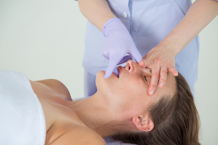 Intraoral massage, intra oral massage, buccal massage, TMJ massage, TMJ treatment at Uma Clinic in Seattle